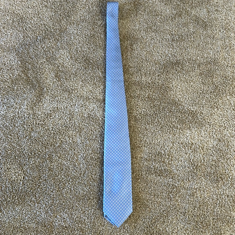 Blue and yellow floral pattern necktie